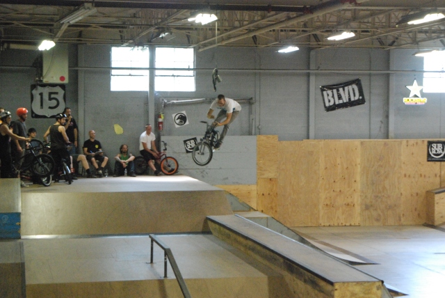 Jeff Gentry sends a barspin over the hip in Expert Park.