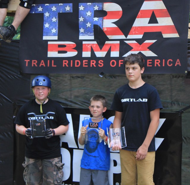 Beginner Dirt Podium: 1st place Rider Delfino (center), 2nd place Sawyer Sorrells (right) and 3rd place Nick Suhr (left). (Photo: Nilo Hodge / ECD)